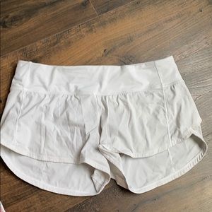 white lululemon speed up shorts